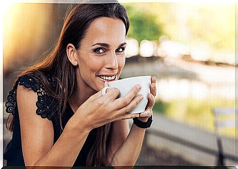 Woman with a coffee cup