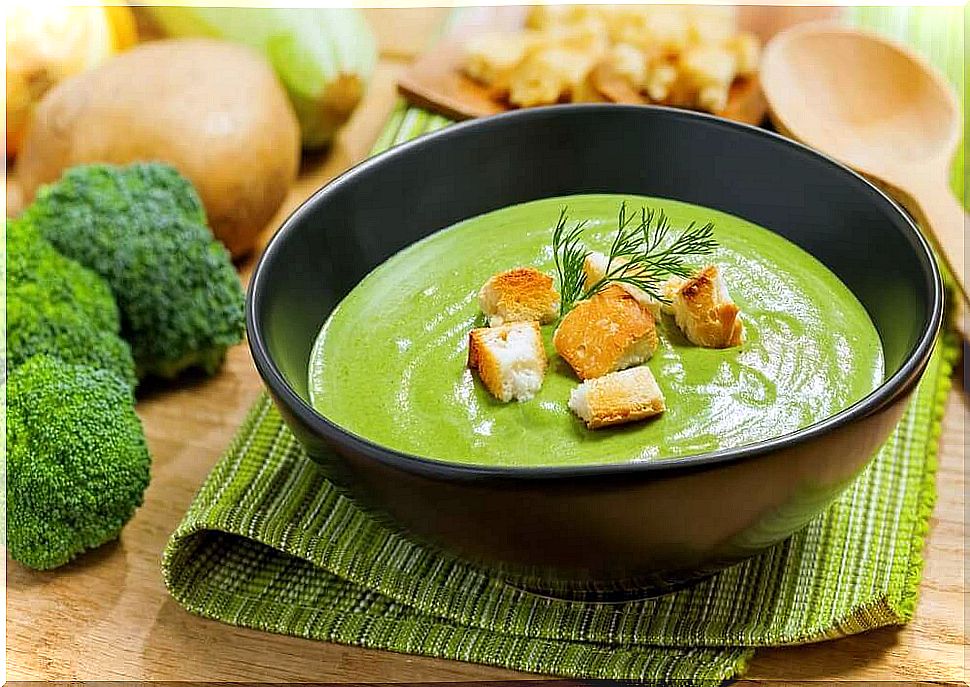 Creamy broccoli soup with poached eggs