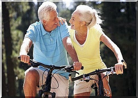 Older couple cycling together