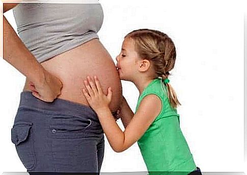 Pregnant woman and daughter