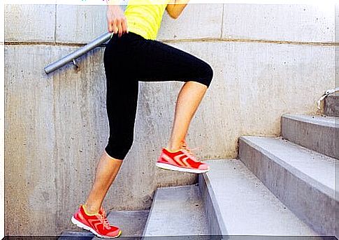 Woman running up stairs