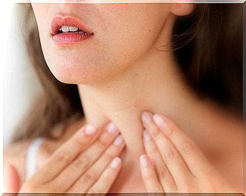 Woman with thyroid pain