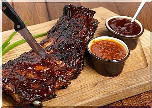 Ribs brushed with barbecue sauce