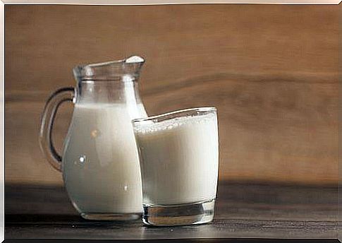 jug and glass of whole milk